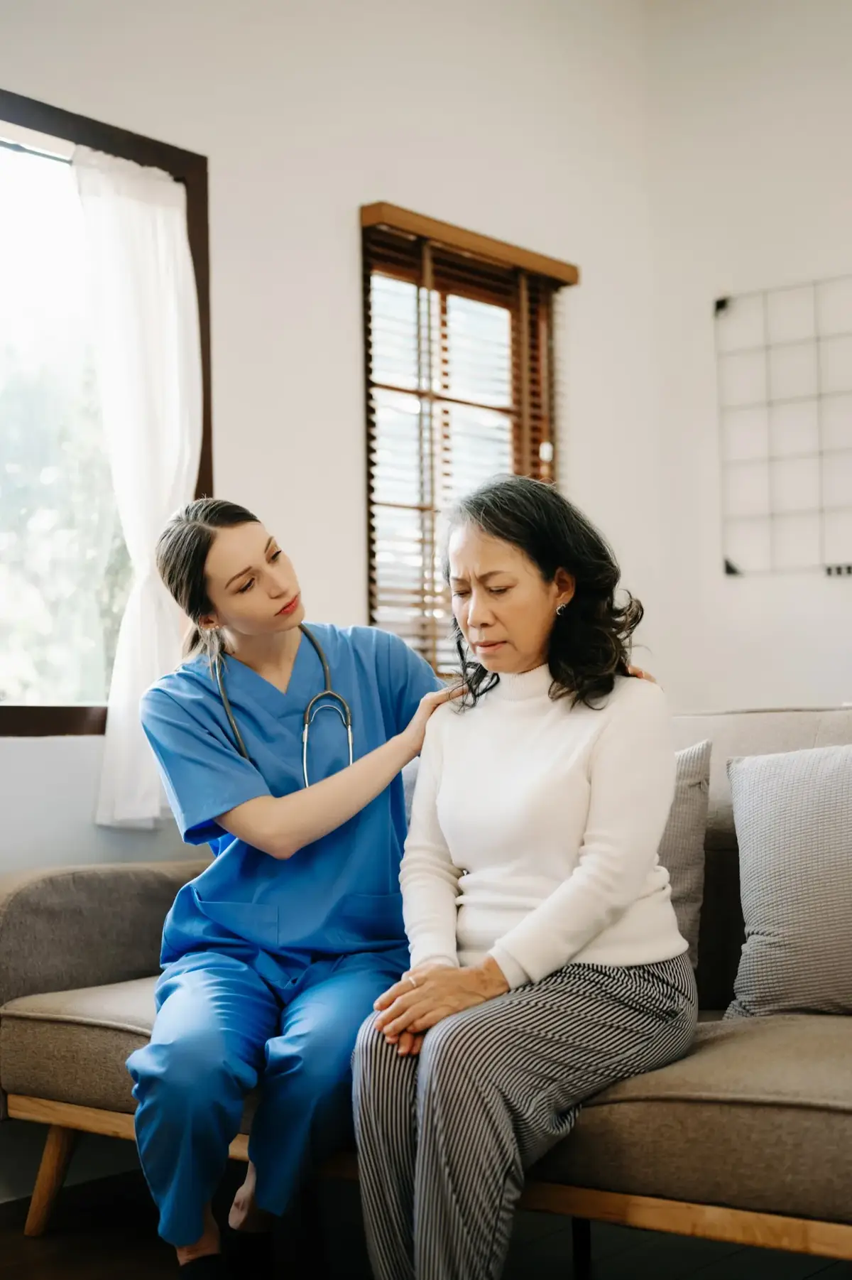 Care team member guiding a patient through at-home treatment